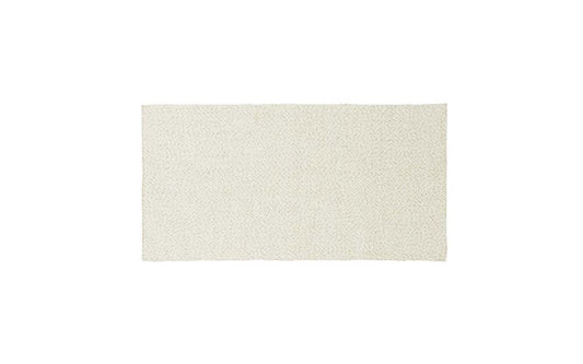 Beige rPET vloerkleed in zandkleur voor duurzaam interieur.