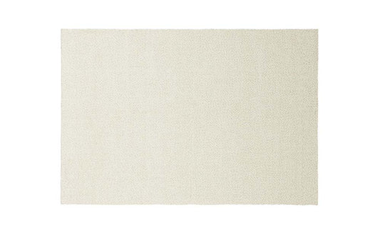 Beige rPET vloerkleed in zandkleur, duurzaam en modern voor interieur.